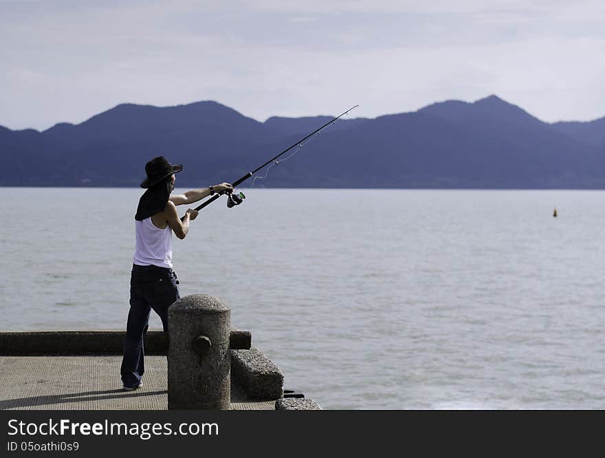 Fisherman fishing trolling in the sea