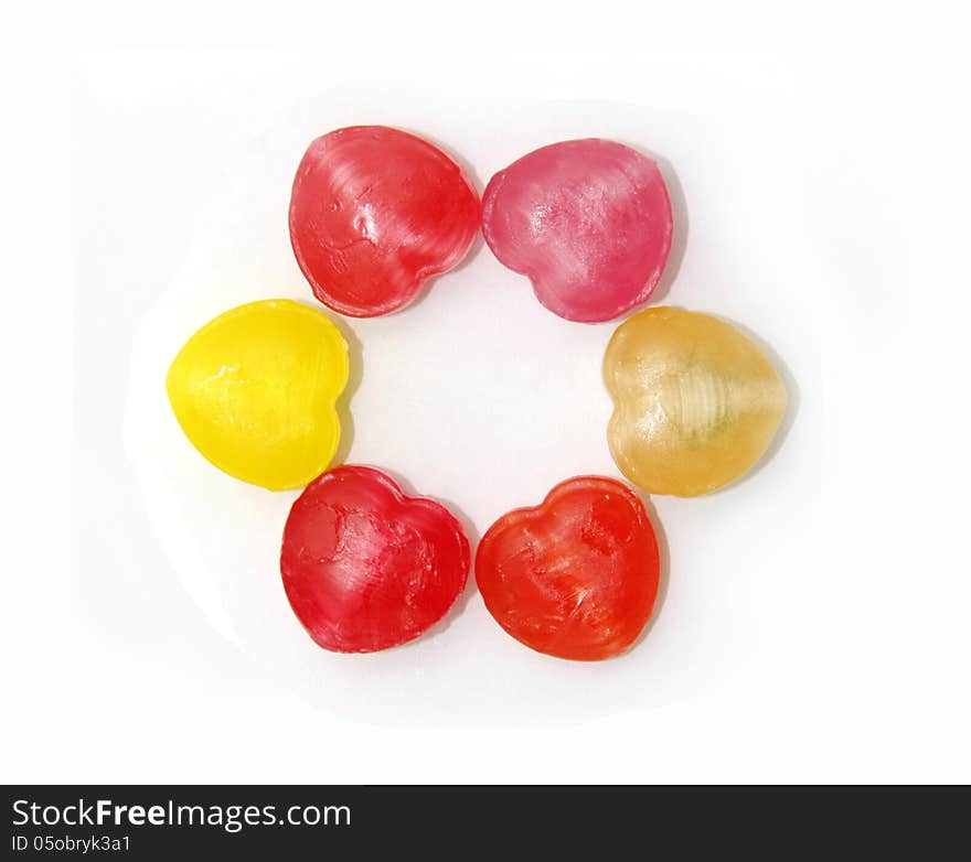 Circle of six colorful candy heart on white backroud