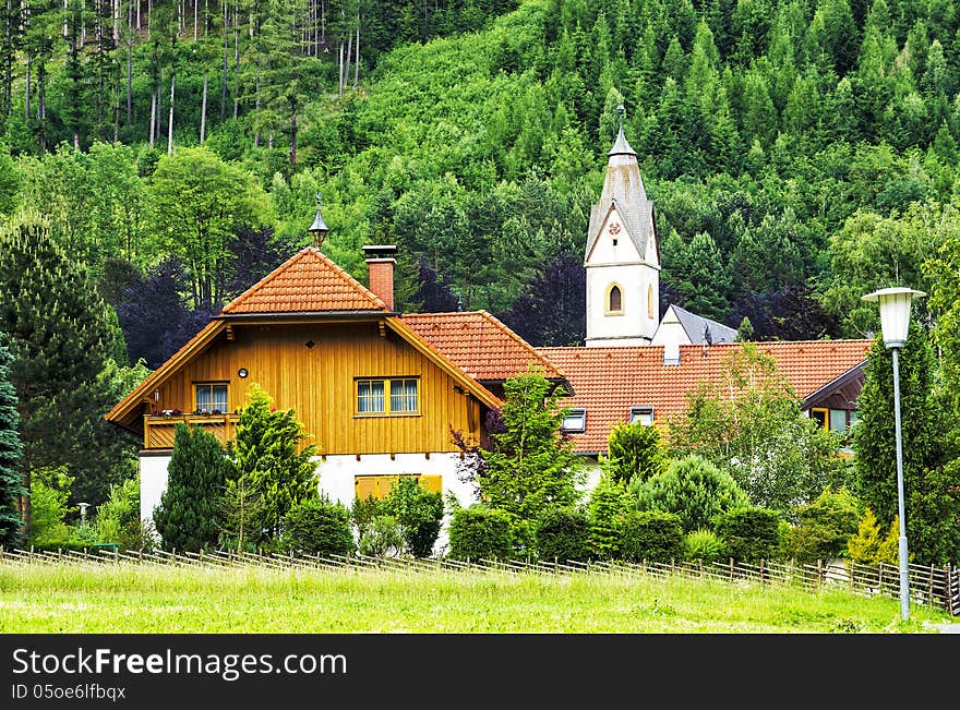 A church at the bottom of a hill.