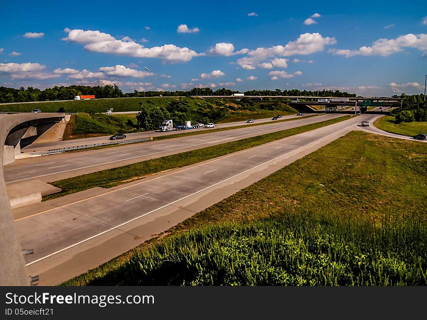 Clover leaf exit ramps on highway near city