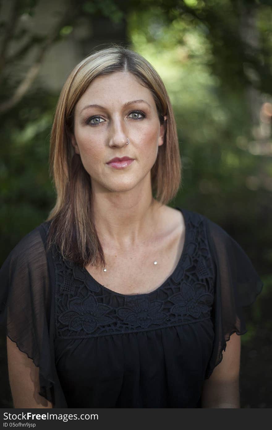 Portrait of a blonde woman with blue eyes. Portrait of a blonde woman with blue eyes.