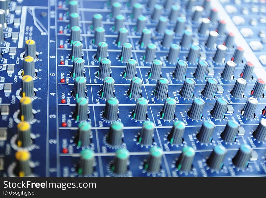 Closeup of sound mixer panel.