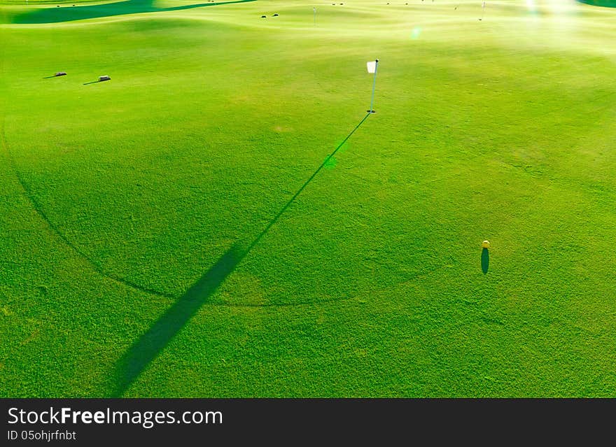 Photo golf courses with bright green grass. Photo golf courses with bright green grass