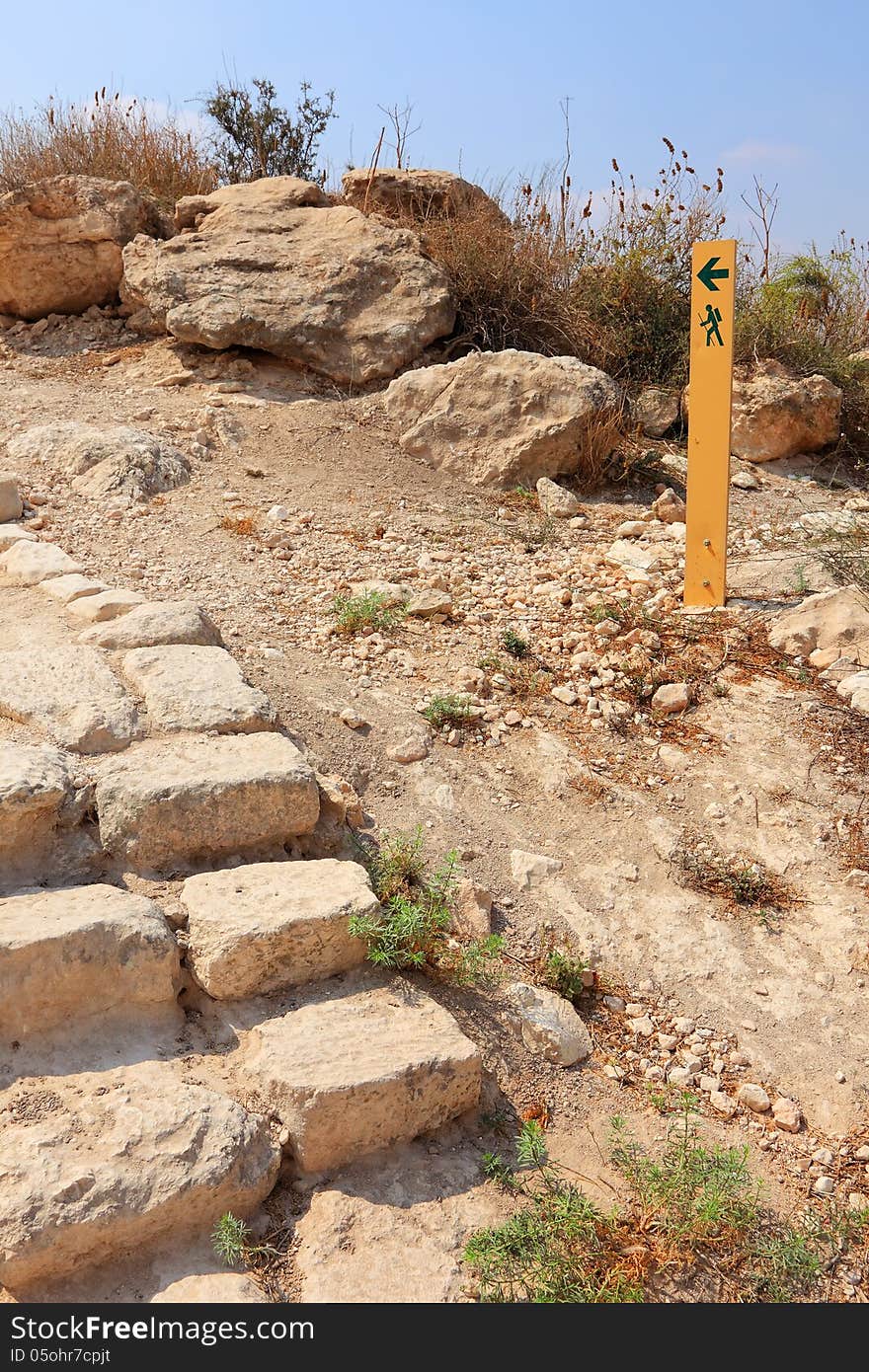 Sand stone ladder and movement directional marker in stone desert. Israel. Sand stone ladder and movement directional marker in stone desert. Israel.