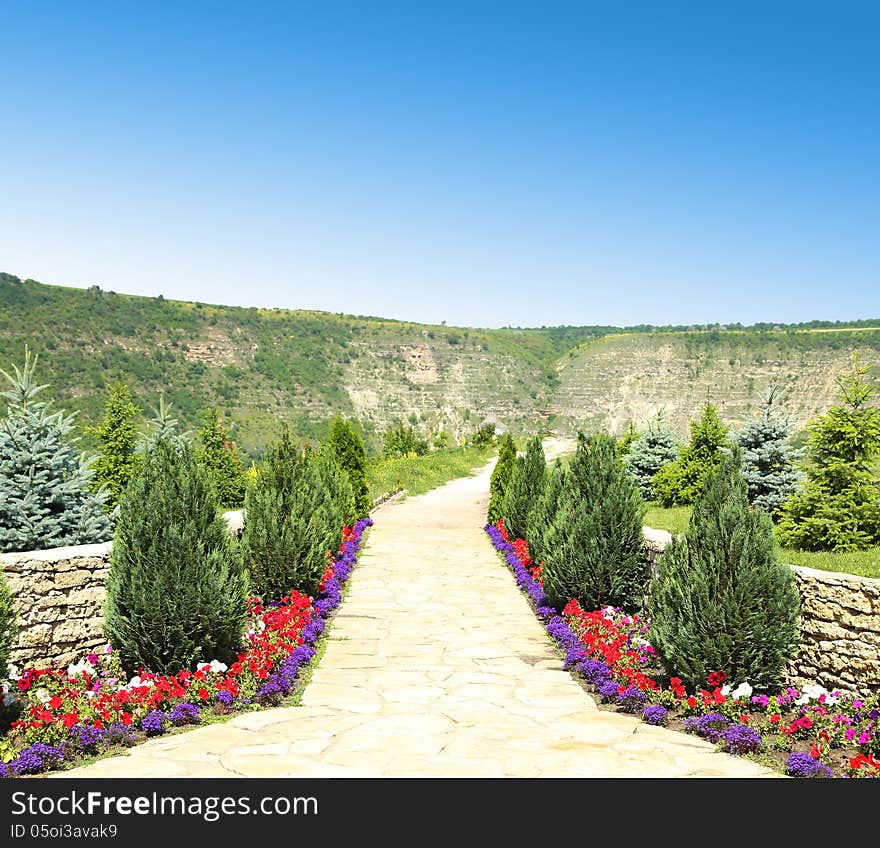 Nice stone walkway from garden in the far