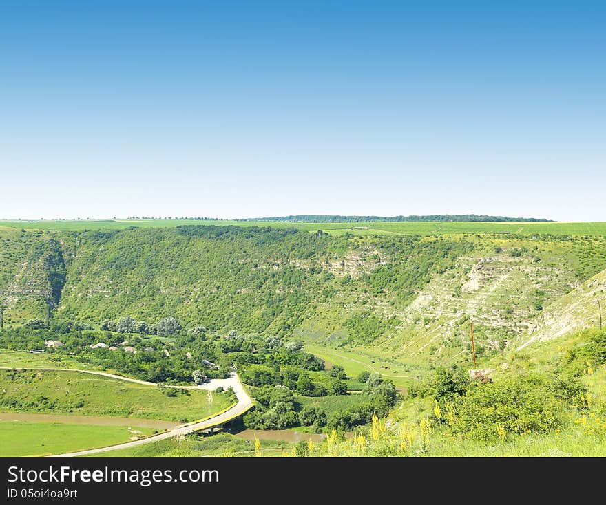 River channel extending along a steep bank