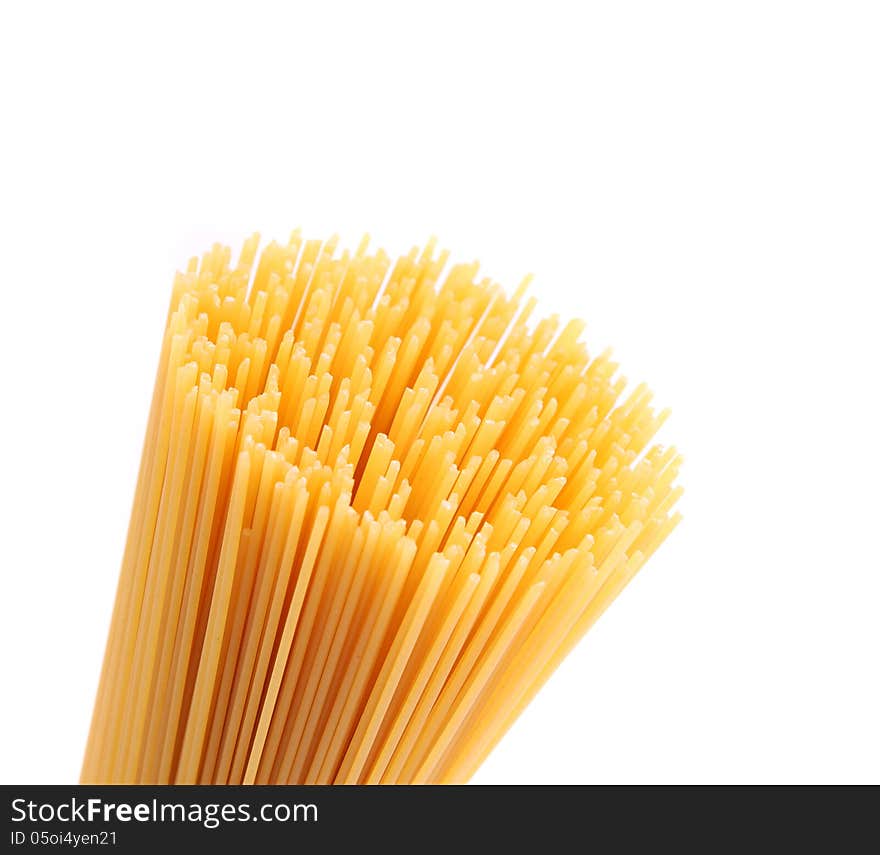 Closeup top bunch spaghetti on a white background