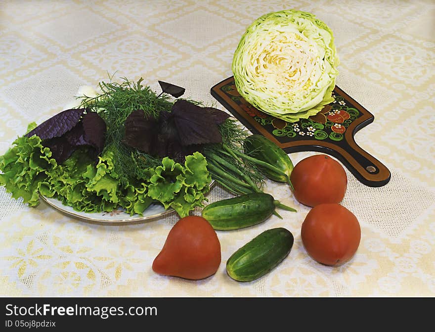 Lettuce, dill, onions and vegetables: tomatoes, cucumbers, cabba