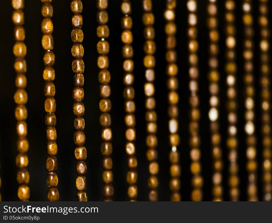 Wood bead curtain closeup. Wood bead curtain closeup