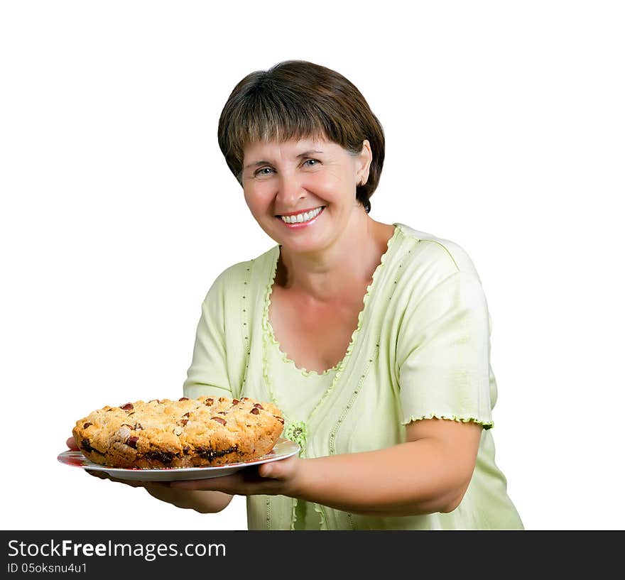 Portrait of a middle-aged woman holding a home-baked