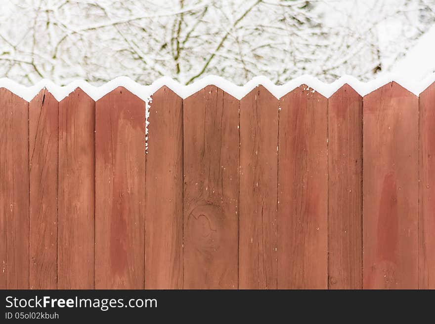 Old Wooden Fence In A Snow