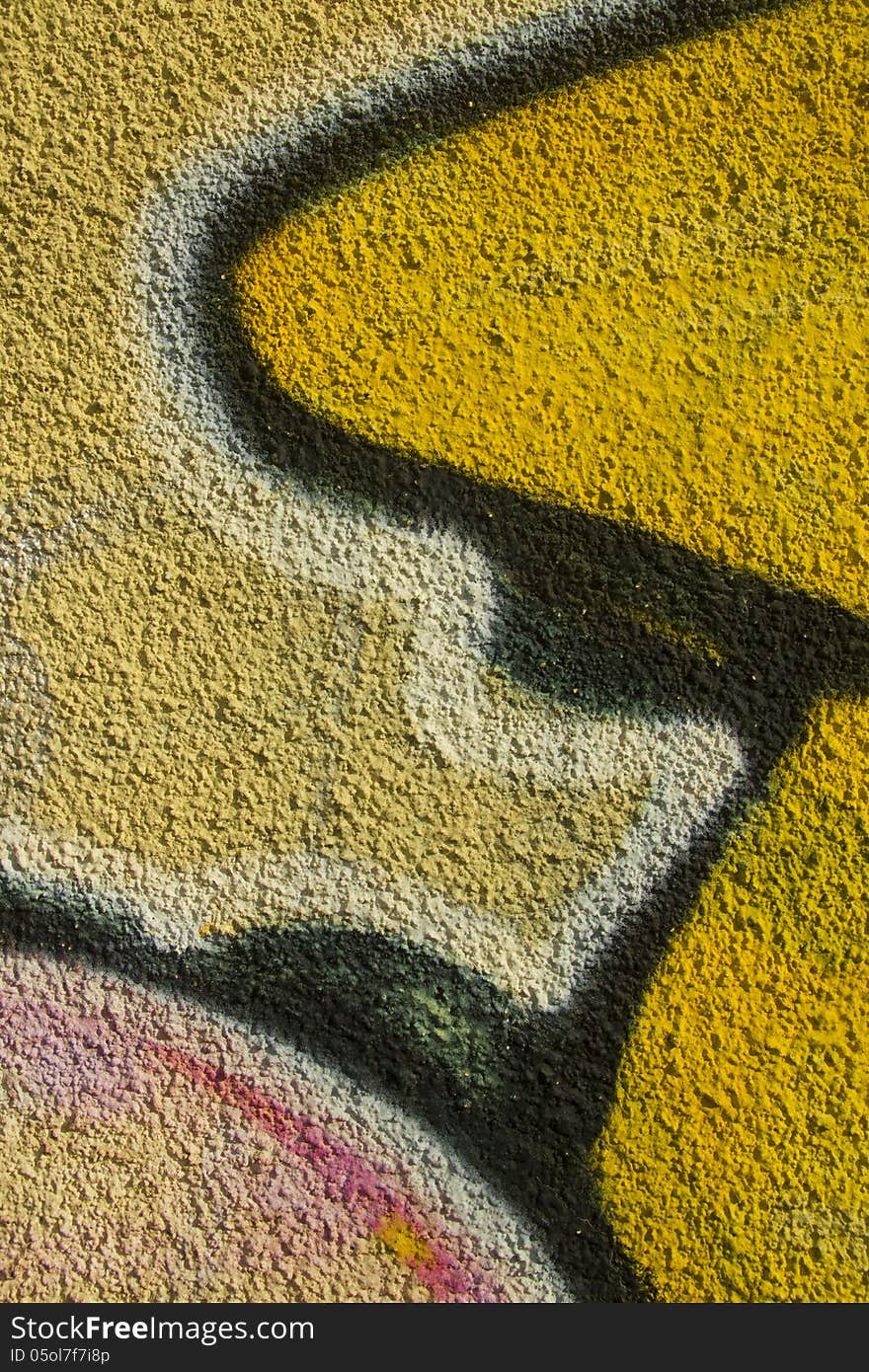 Close-up texture of wall with graffiti in urban setting. Close-up texture of wall with graffiti in urban setting