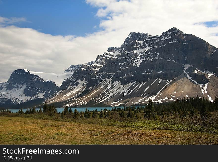 Magnificent views of the Canadian Rocky Mountains and glacial lake at the foot of them, Alberta, Canada