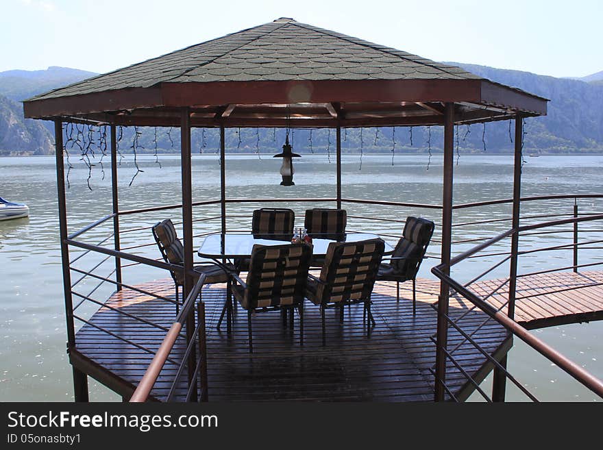 Waterfront terrace wooden floors and banister protection