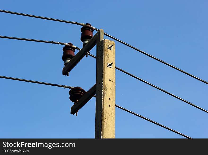 Electricity post in blue sky. Electricity post in blue sky