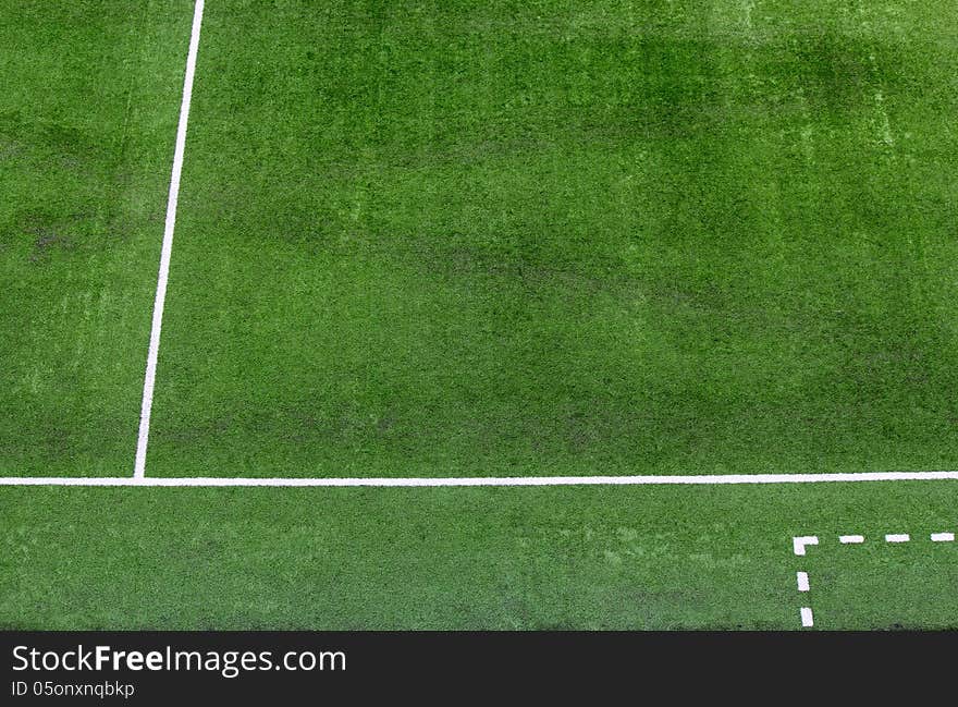 FOOTBALL FIELD FRAGMENT WITH WHITE LINES. FOOTBALL FIELD FRAGMENT WITH WHITE LINES