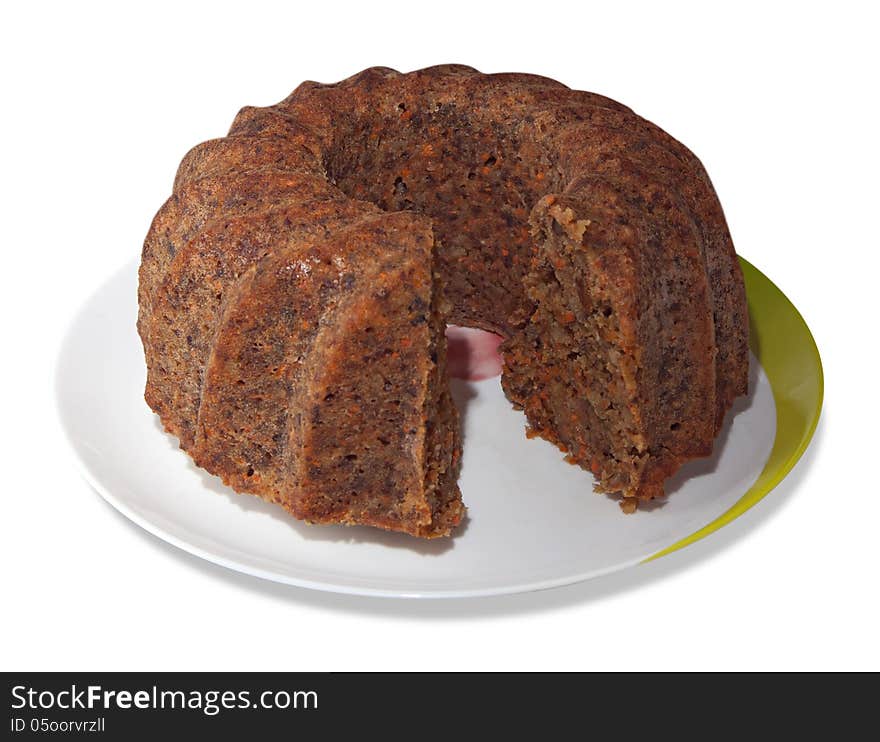 Carrot pie on a plate isolated over white background. Carrot pie on a plate isolated over white background