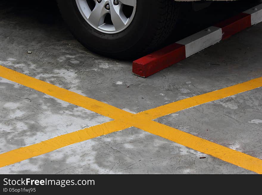 Yellow line in the parking lot outdoor.