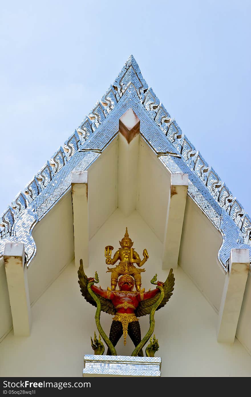 Detail Of giant statues on the roof Roof, Thailand.