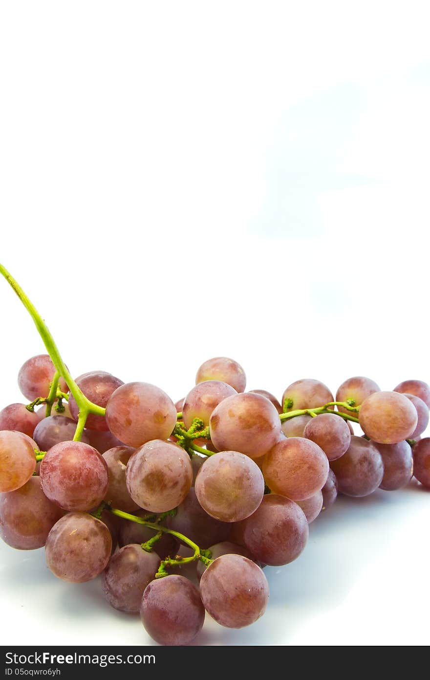 Red grapes isolated on white. Red grapes isolated on white.