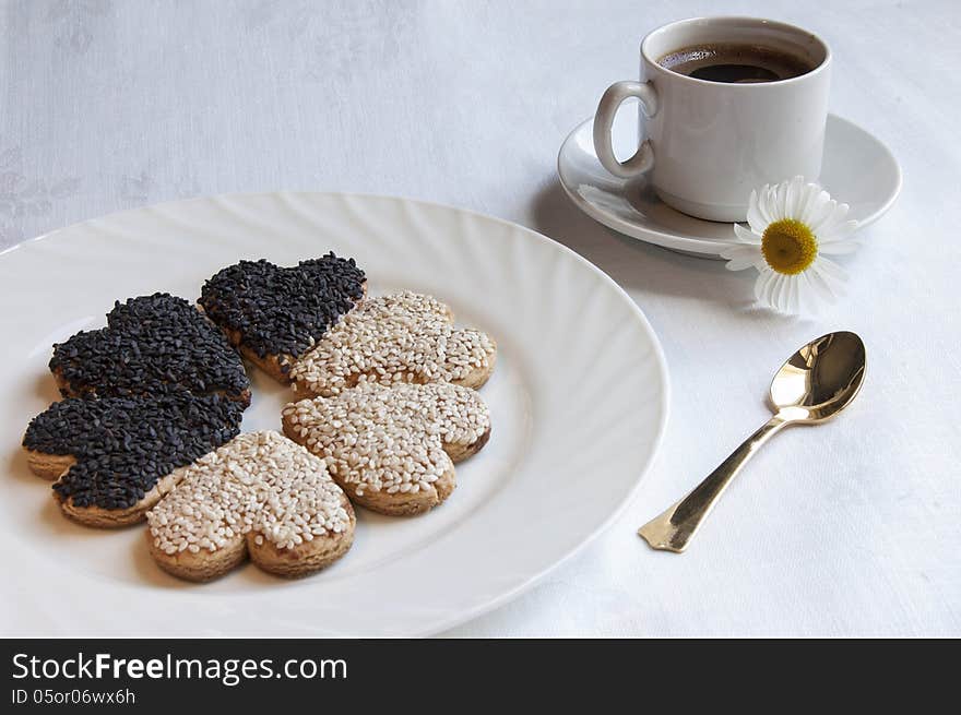 Cookies for the wedding with a cup of coffee