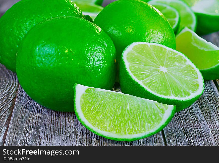 Limes on a wooden table