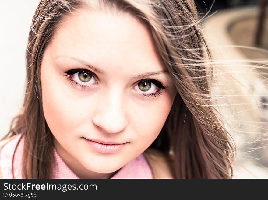 Portrait of serious beautiful girl outdoor