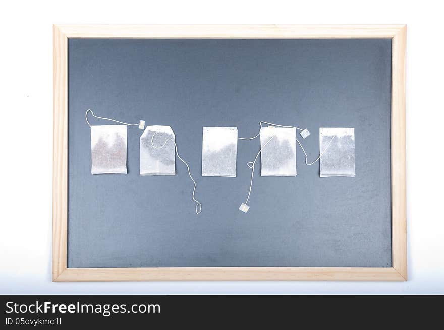 Tea bags on a black background