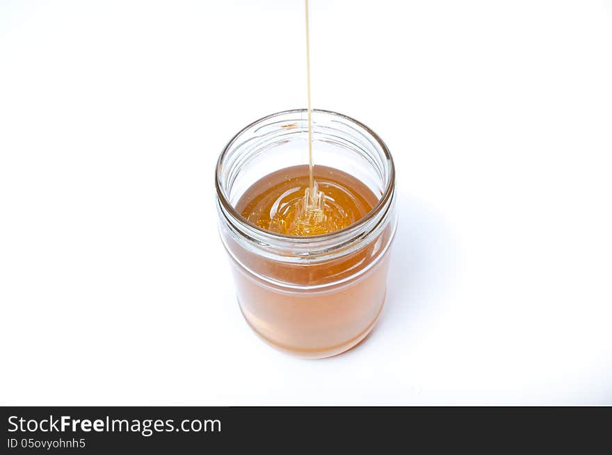 Honey on a white background