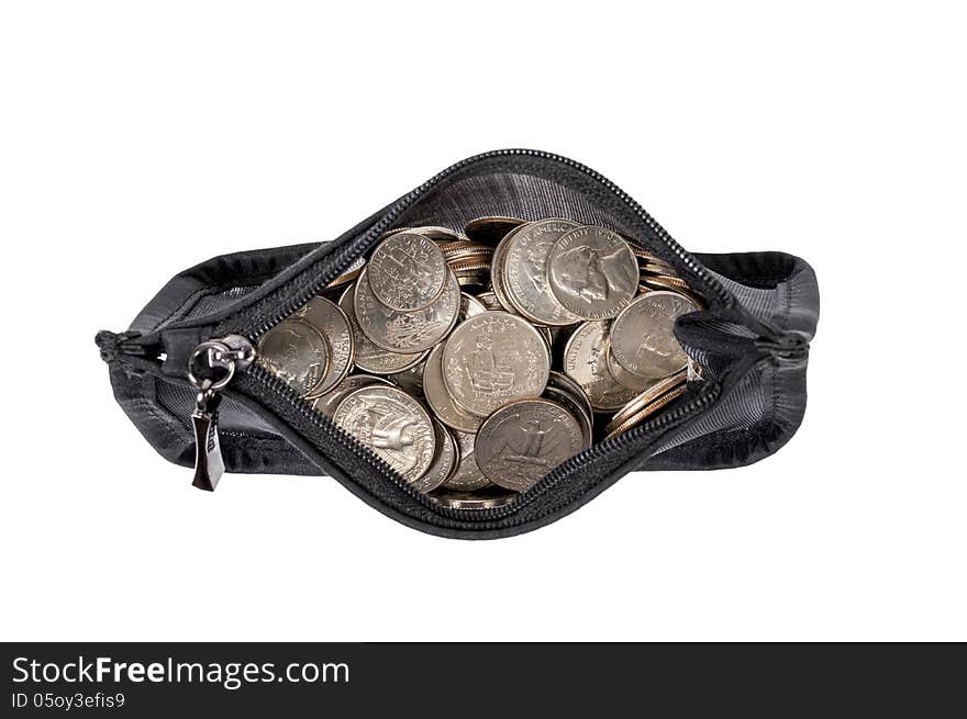 Horizontal and overhead shot of coins in a coin purse. Isolated on a white background. Horizontal and overhead shot of coins in a coin purse. Isolated on a white background.