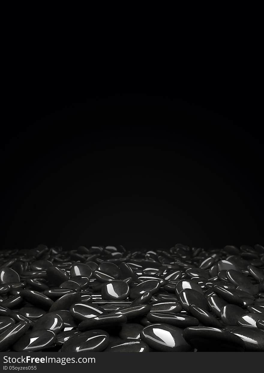 Stones scattered on the surface of a black background. Stones scattered on the surface of a black background