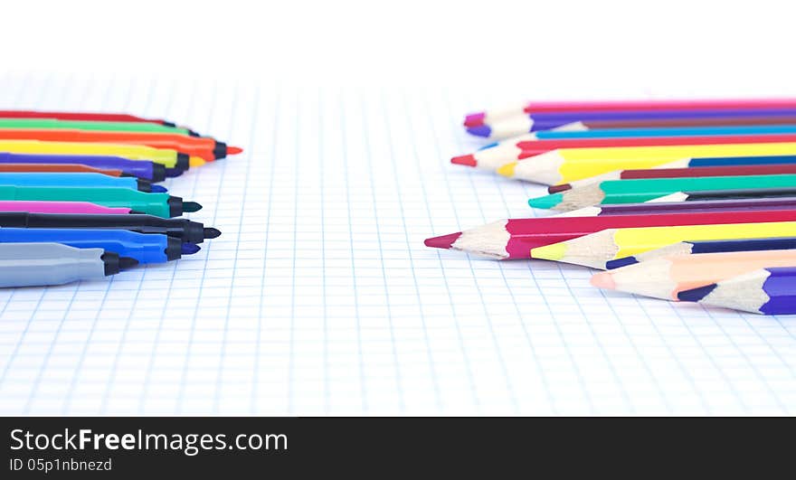 Felt Pens And Pencils  Opposite Each Other