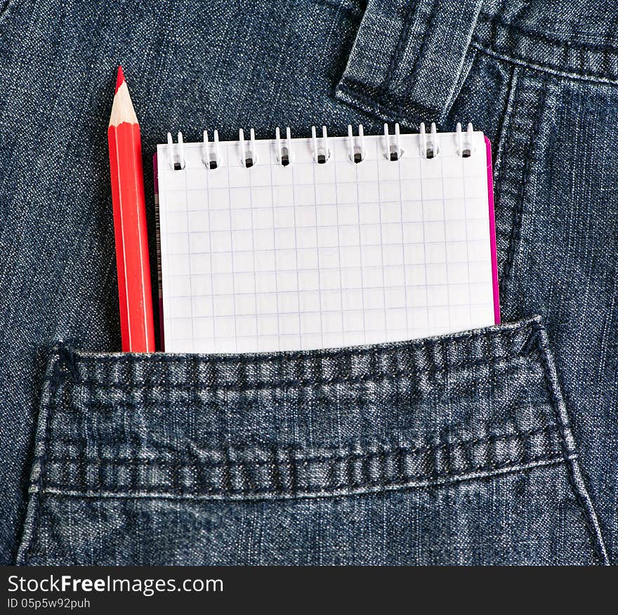 Notebook And Pencil In Jeans Pocket