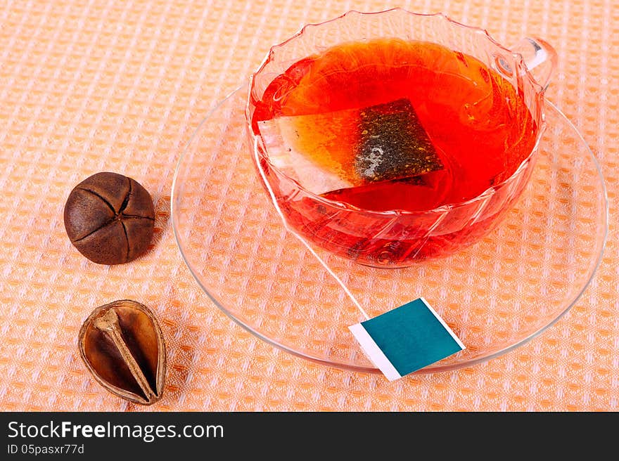 Сup of tea with tea bag in a glass cup