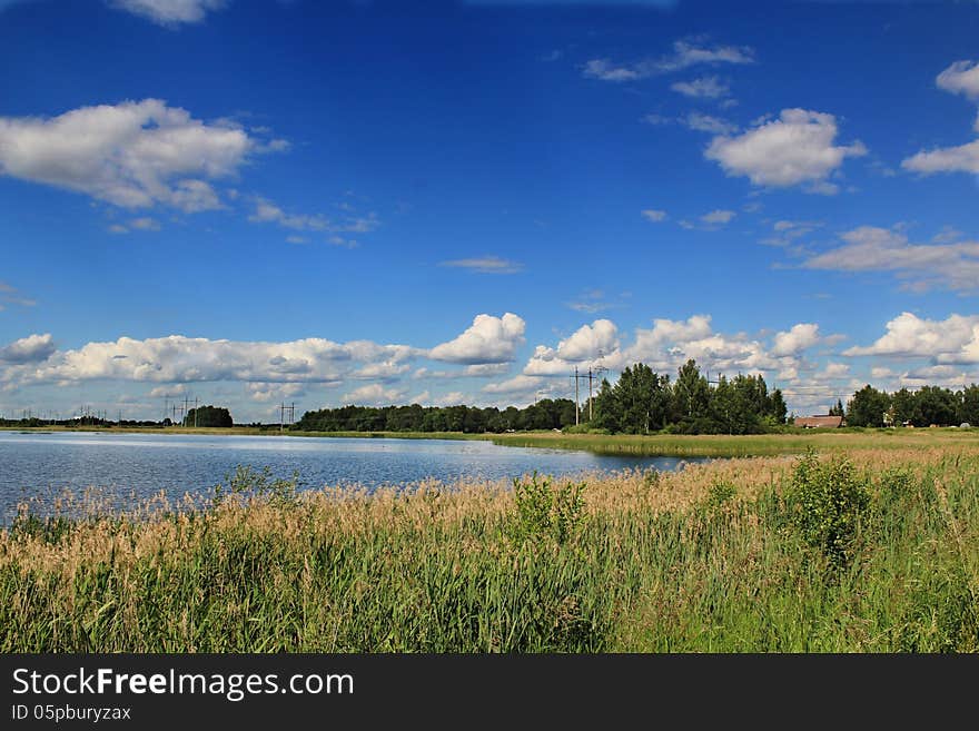 Landscape of the lake in the summer, blue sky