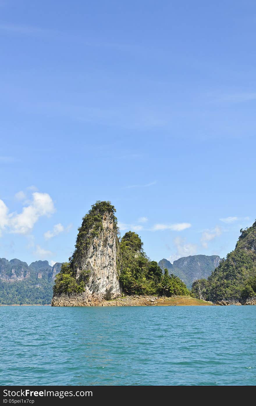 Beautiful island surrounded by water, Natural attractions in Ratchapapha dam at Surat Thani province, Guilin of Thailand.