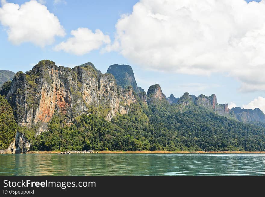 Beautiful mountain surrounded by water, Natural attractions in Ratchapapha dam at Surat Thani province, Guilin of Thailand. Beautiful mountain surrounded by water, Natural attractions in Ratchapapha dam at Surat Thani province, Guilin of Thailand.