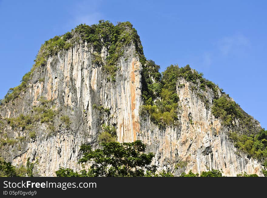 Exotic high cliffs of limestone mountain. Thailand. Exotic high cliffs of limestone mountain. Thailand