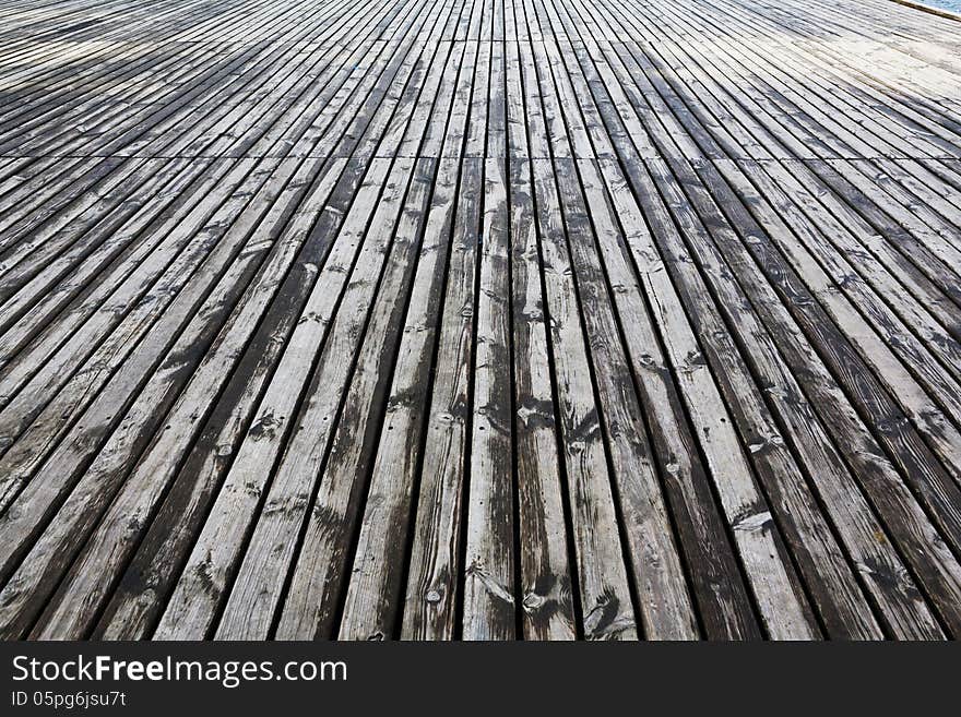 Grungy gray aged floor natural wood background. Grungy gray aged floor natural wood background