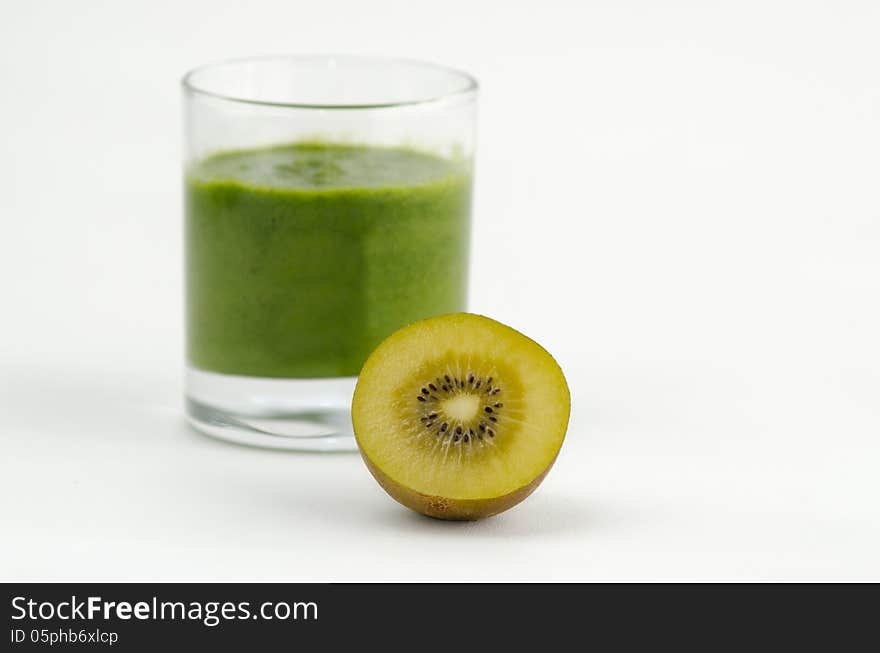 Green smoothie alkaline diet drink with fresh kiwi fruit.