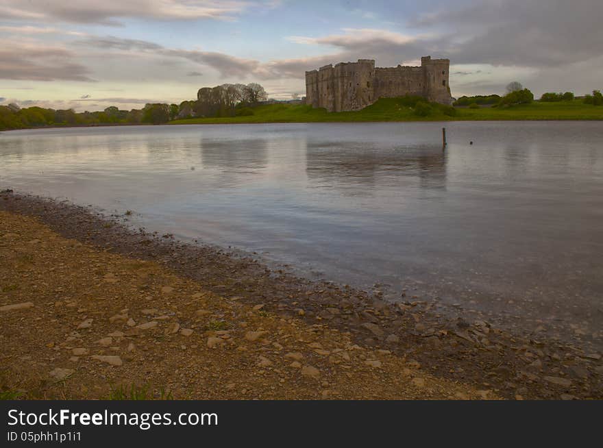 Carew castle over the lake