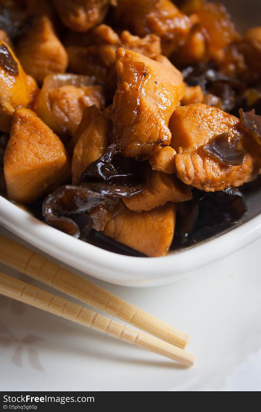 Traditional asian food with meat, chinese black mushrooms &#x28;black fungus&#x29;, onions and ginger. Traditional asian food with meat, chinese black mushrooms &#x28;black fungus&#x29;, onions and ginger