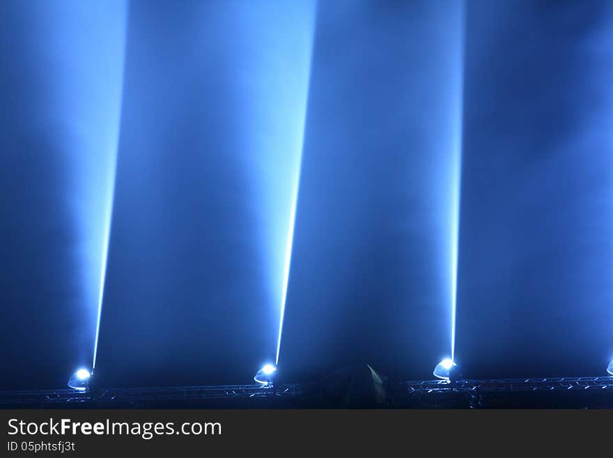 Close up of water fountains blue illuminated. Close up of water fountains blue illuminated.