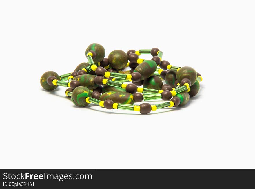 Handmade beads brown, green and yellow color. Handmade beads brown, green and yellow color