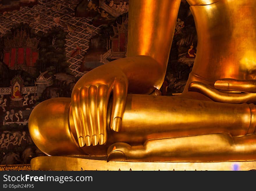 Golden Buddha statue right hands