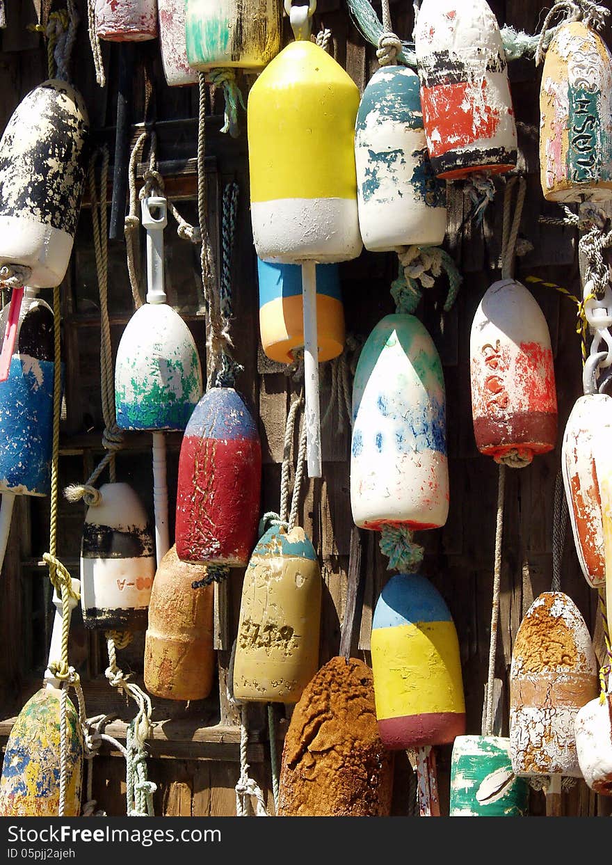 Buoys hanging on the side of bait shop