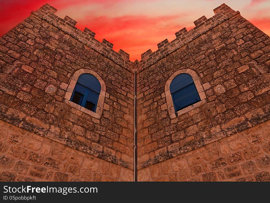 Monastery wall on the sunset background. Beit Jemal women's Catholic monastery. Israel. Monastery wall on the sunset background. Beit Jemal women's Catholic monastery. Israel