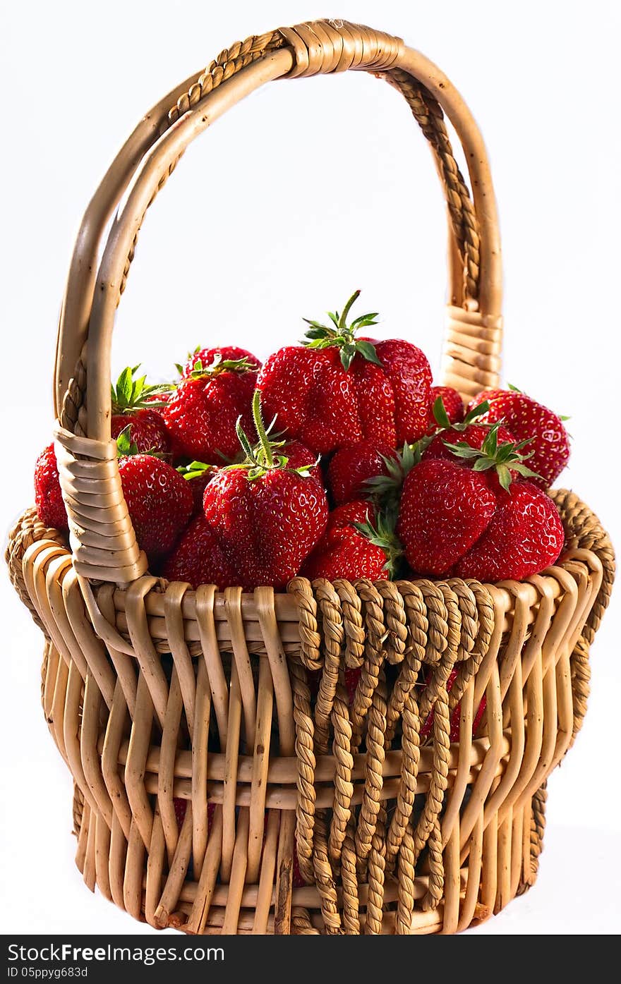 Natural large fresh strawberries in a basket