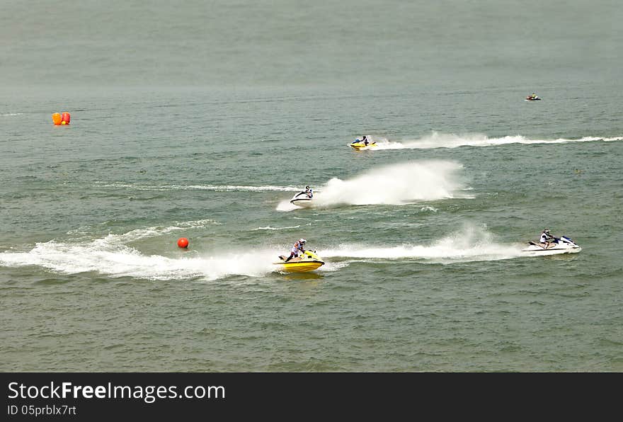 Jet-Ski race in the wide river