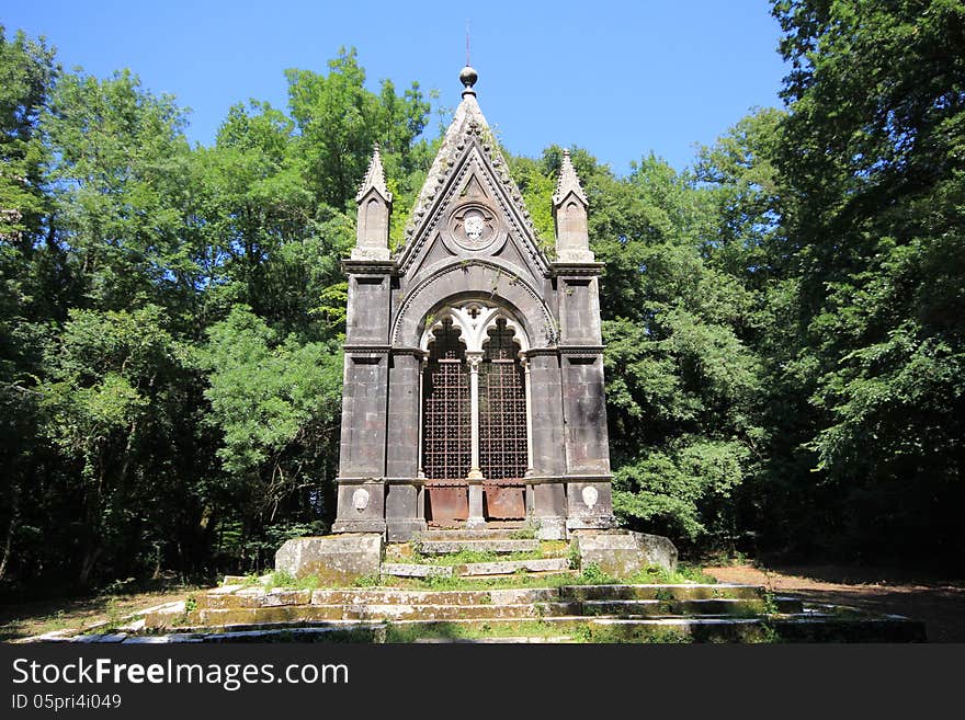 Gravestone in the italian forest